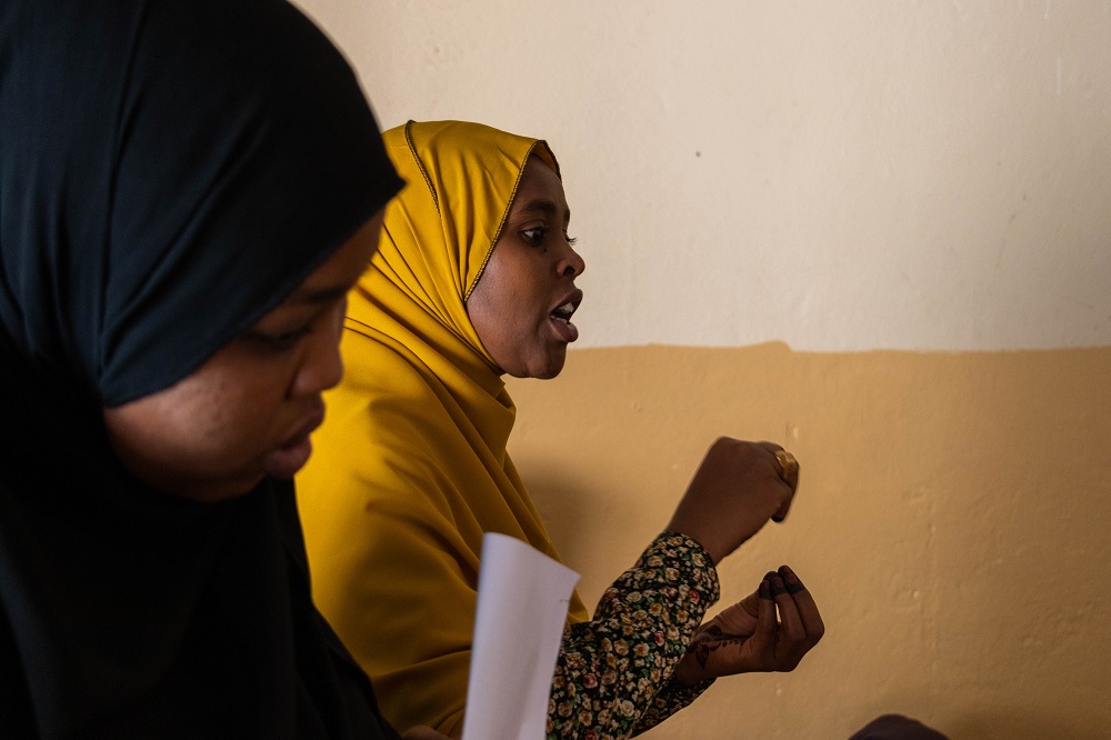 Khadan Abdilahi talks about the negative impact of FGM with a group of women in the village of Sanani, near Hargeisa, Somaliland June 30, 2019. u00e2u20acu201d Thomson Reuters Foundation pic