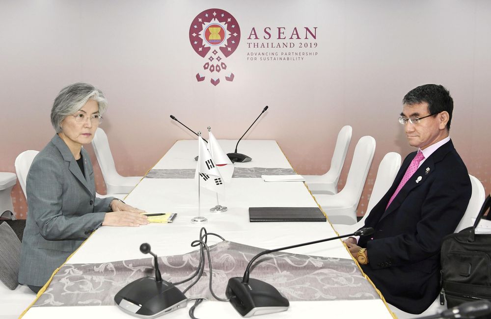 South Korean Foreign Minister Kang Kyung-wha (left) meets her Japanese counterpart Taro Kono during the Asean Foreign Ministers' Meeting in Bangkok, Thailand, August 1, 2019. u00e2u20acu201d Kyodo pic via Reuters
