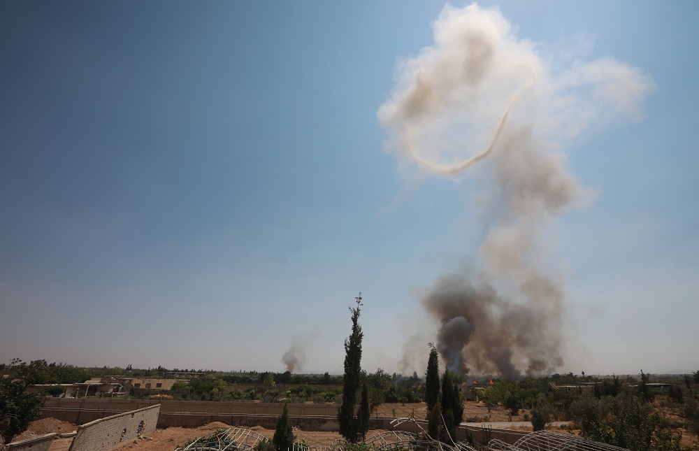 Members of the engineering units of the Syrian army (not pictured) detonate explosives seized from the opposition in the former rebel stronghold of Douma in the eastern Ghouta region, on the outskirts of the Syrian capital Damascus July 1, 2019. u00e2u20acu201d AFP p