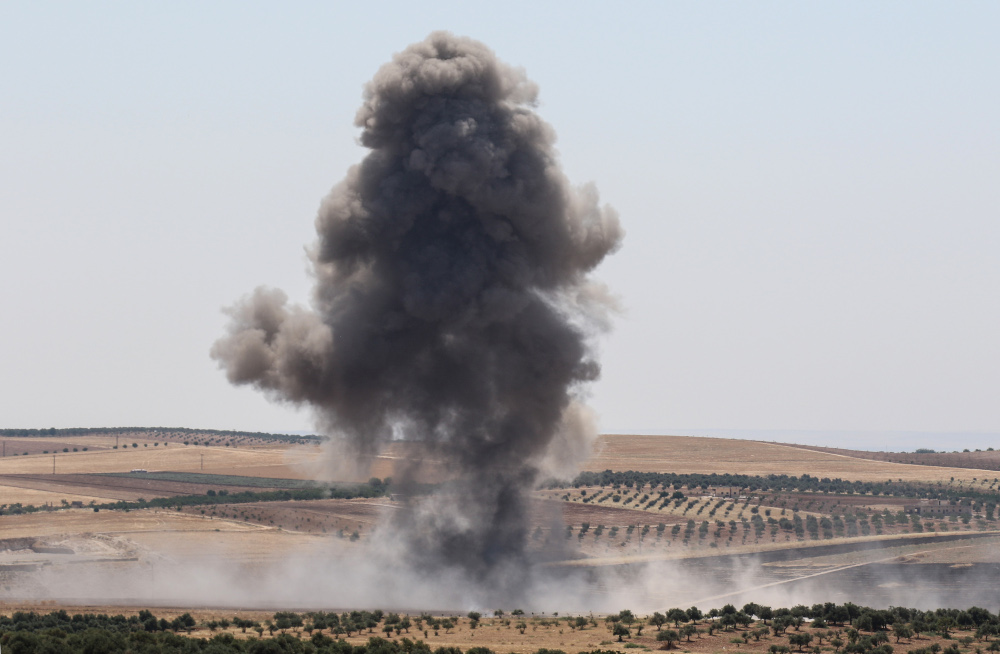 In this file photo taken July 11, 2019, smoke billows after reported regime air strikes near Khan Sheikhun in Syriau00e2u20acu2122s Idlib province. u00e2u20acu201d AFP pic