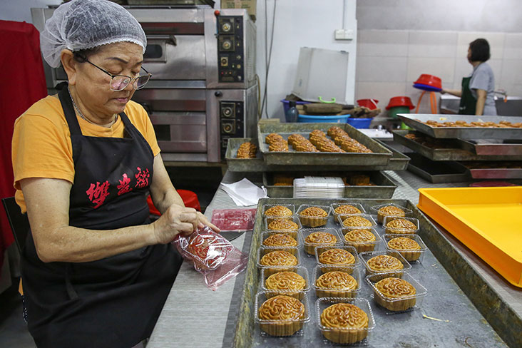 The mooncakes are packed by hand for the pre-orders.