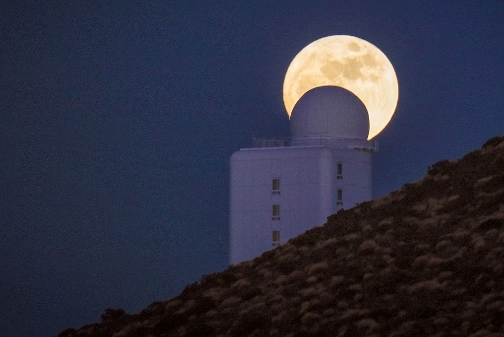 In this file photo taken on December 13, 2016, the full moon is seen behind a telescope of the Spainu00e2u20acu2122s Institute of Astrophysics of the Canary Islands, in the National Park of El Teide, on the Spanish canary island of Tenerife. u00e2u20acu201d AFP pic       