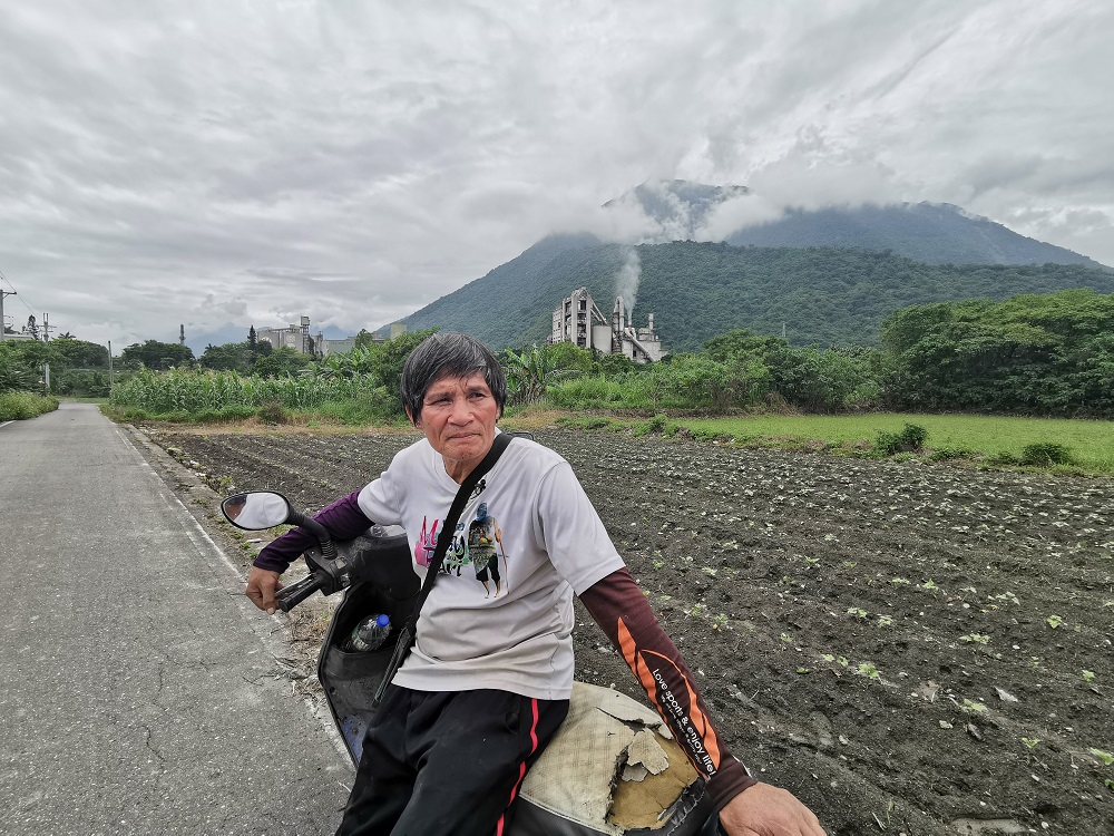 Miya Yudaw, 65, a member of Taiwanu00e2u20acu2122s Truku People, sits in front of his farmland in Xiulin township, Hualien County, eastern Taiwan May 8, 2019. u00e2u20acu201d Thomson Reuters Foundation pic