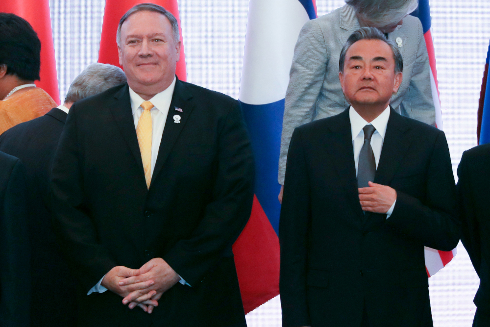 US Secretary of State Mike Pompeo stands next to Chinau00e2u20acu2122s Foreign Minister Wang Yi during the 26th Association of South-east Asian Nations (Asean) Regional Forum in Bangkok August 2, 2019. u00e2u20acu201d AFP pic 