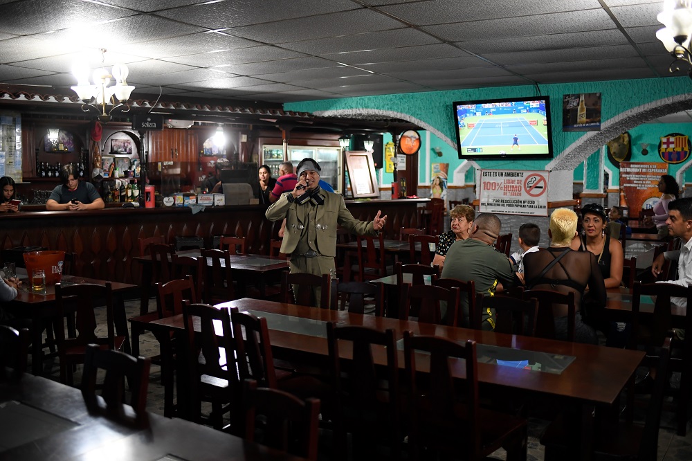 Venezuelan nurse Edgar Fernandez, who works at a state hospital, sings in mariachi costume at a restaurant at the town of El Junquito near Caracas August 24, 2019. u00e2u20acu201d AFP pic