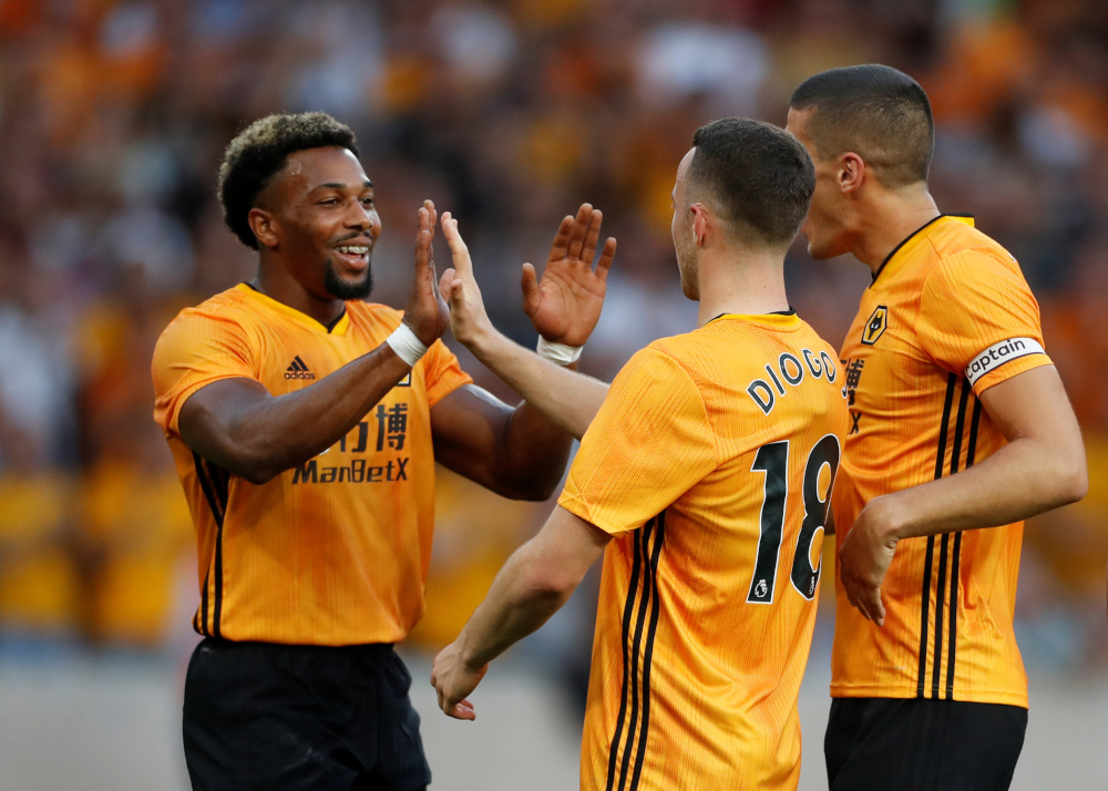 Wolverhampton Wanderersu00e2u20acu2122 Diogo Jota celebrates scoring their first goal with Adama Traore in the Europa League second qualifying round first leg match against Crusaders at the Molineux Stadium in Wolverhampton, Britain July 25, 2019. u00e2u20acu201d Action Images v