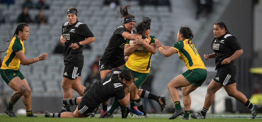 New Zealandu00e2u20acu2122s Liz Patu (centre, left) and Michaela Leonard tackle Australiau00e2u20acu2122s Toka Natua (right) during the Rugby Test match between the Australia Wallaroos and New Zealand Blacks Ferns in Auckland on August 17, 2019. u00e2u20acu201d AFP pic