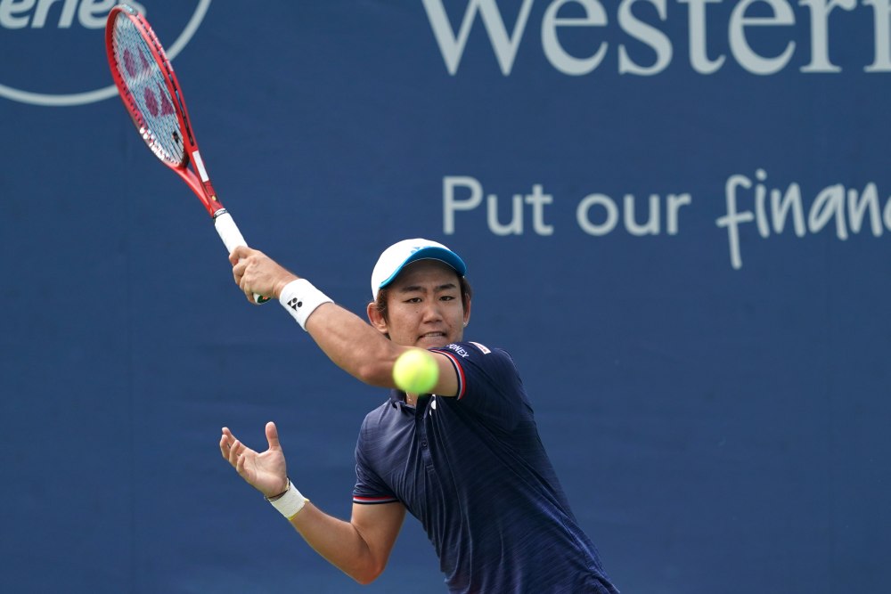 Yoshihito Nishioka (pic) returns a shot against Kei Nishikori during the Western and Southern Open tennis tournament in Cincinnati August 14, 2019. u00e2u20acu2022 Picture by Aaron Doster-USA TODAY Sports via Reuters
