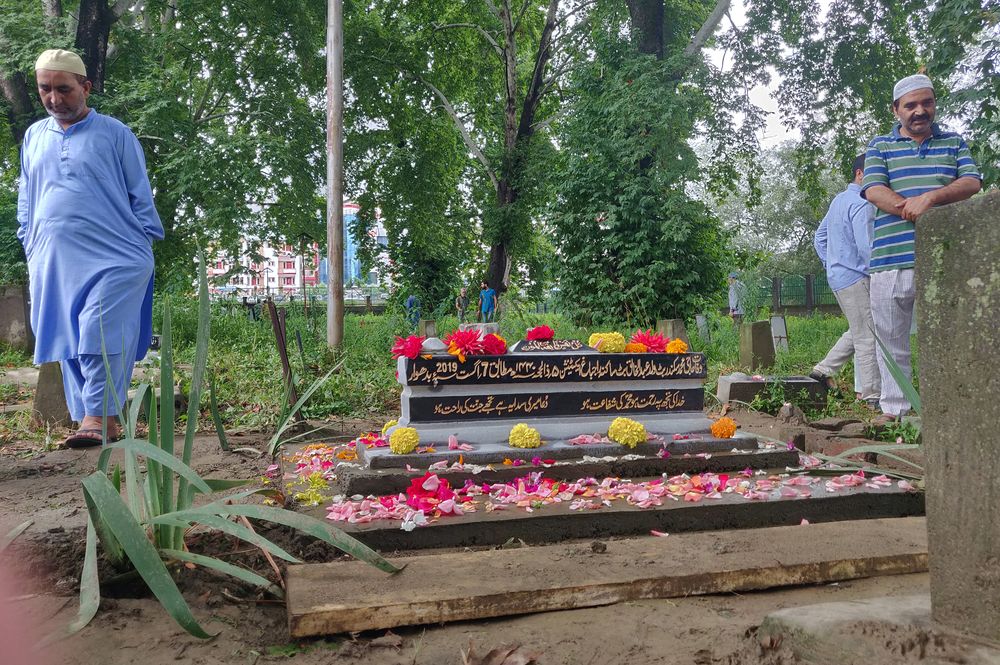 People leave after offering prayers at the grave of Mohammad Sikander Bhat, during restrictions after Indian government scrapped the special constitutional status for Kashmir, in Srinagar August 10, 2019. u00e2u20acu201d Reuters pic