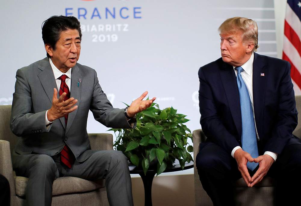 US President Donald Trump and Japan's Prime Minister Shinzo Abe hold a bilateral meeting during the G7 summit in Biarritz, France August 25, 2019. u00e2u20acu201d Reuters pic