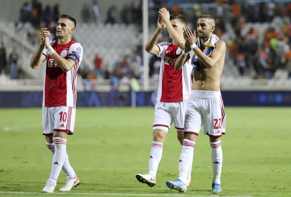 Ajax's players greet their supporters after the Uefa Champions League playoff football match against Cyprus' APOEL Nicosia in Nicosia on August 20, 2019. u00e2u20acu2022 AFP pic