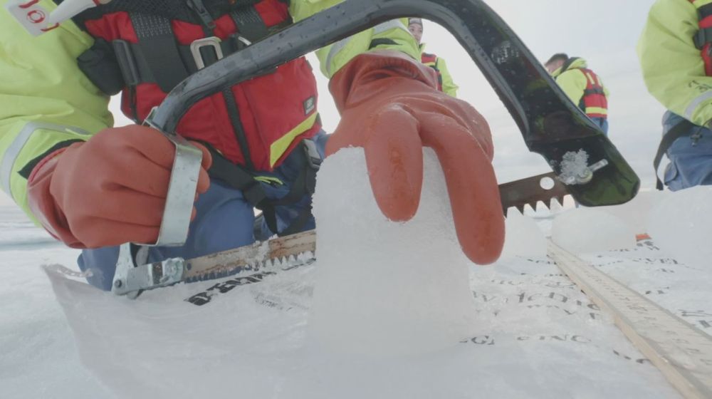 A scientist from the US-led Northwest Passage Project saws an ice core drilled from the Canadian Arctic during an 18-day icebreaker expedition that took place in July and August 2019. u00e2u20acu201d Reuters pic
