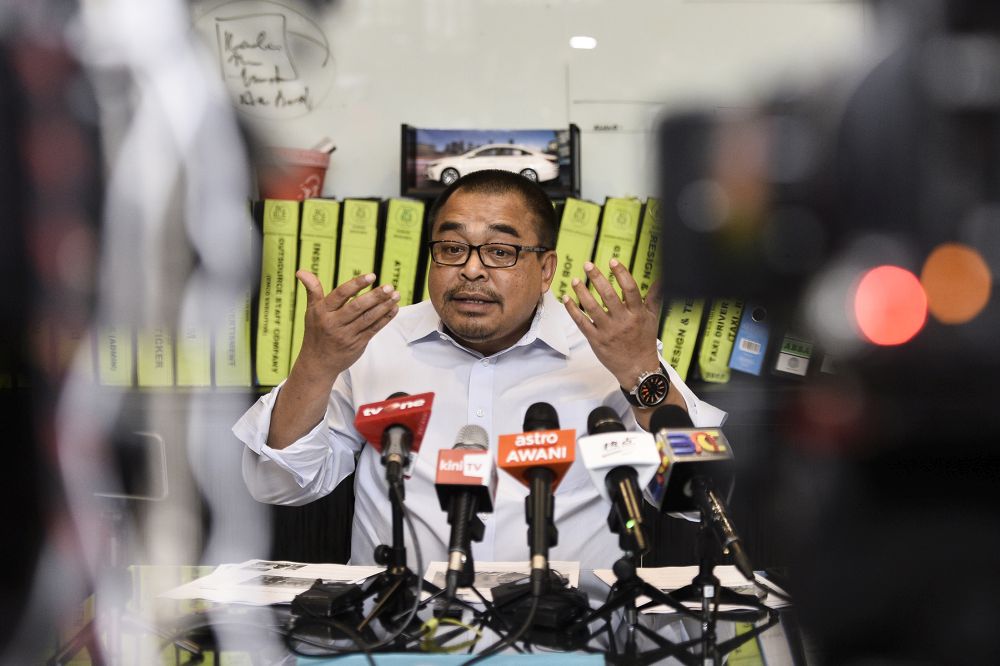 Big Blue Taxi founder Datuk Shamsubahrin Ismail speaks during a press conference at Wisma Central, Kuala Lumpur on August 28, 2019. u00e2u20acu2022 Picture by Miera Zulyana