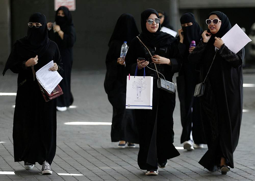 Saudi females walk at the exhibition to guide job seekers at Glowork Women's Career Fair in Riyadh, Saudi Arabia October 2, 2018. u00e2u20acu201d Reuters pic