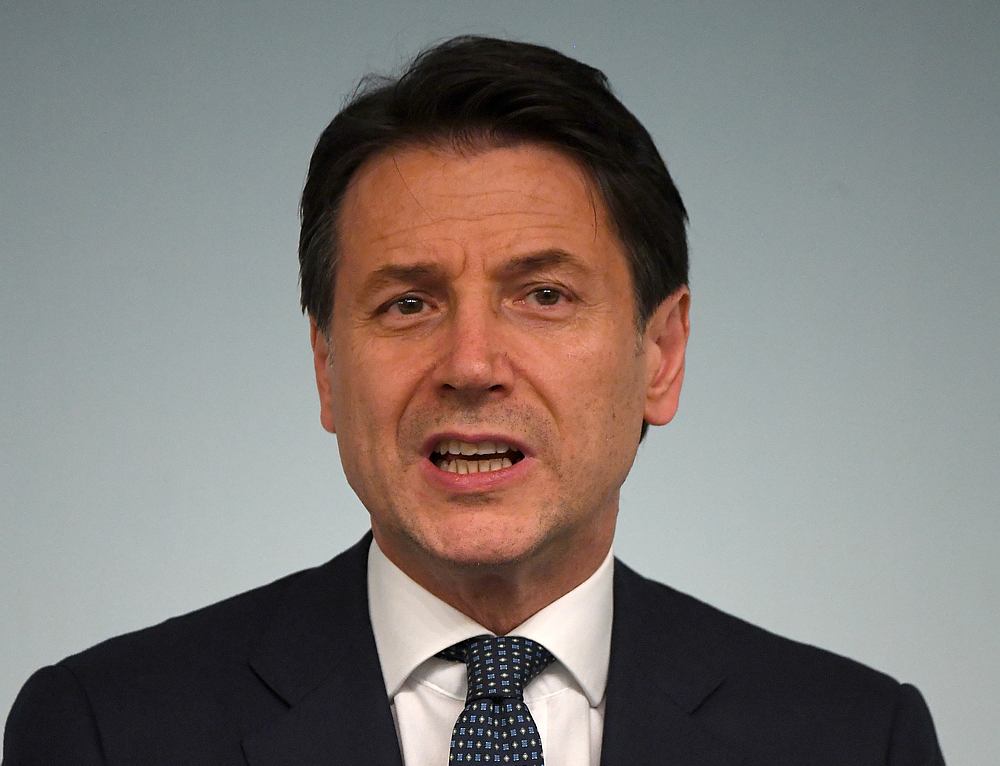 Italian Prime Minister Giuseppe Conte reacts to Italy's ruling coalition breakdown, speaking to journalists at an impromptu, late evening news conference at government house in Rome August 8, 2019. u00e2u20acu201d Reuters pic