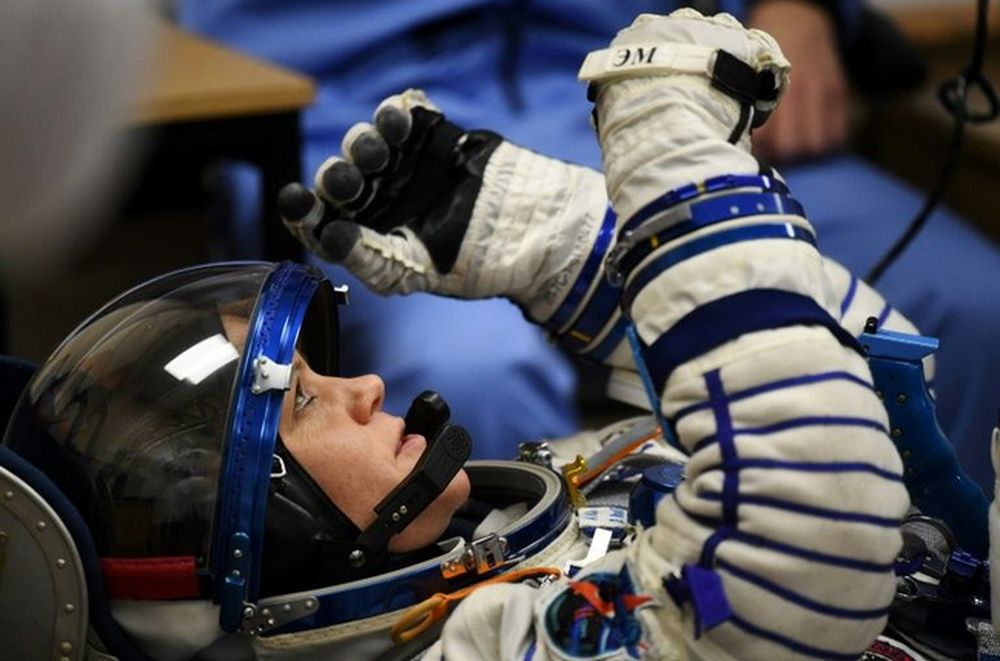 Nasa astronaut Anne McClain, pictured in December 2018, is accused of identity theft and improperly accessing her estranged wife's private financial record, The New York Times reported. u00e2u20acu201d AFP pic
