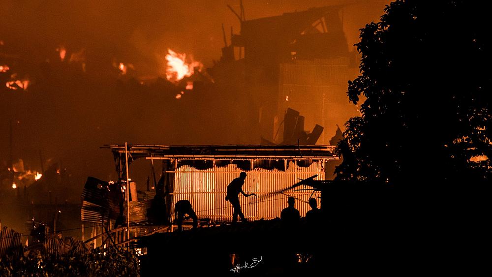 Flames engulf a slum after a fire broke out in Dhaka, Bangladesh August 16, 2019. u00e2u20acu201d Abdur R Saad/social media pic via  Reuters
