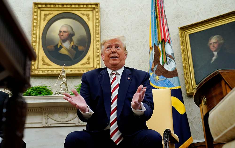 US President Donald Trump answers questions from reporters in the Oval Office of the White House in Washington August 20, 2019. u00e2u20acu201d Reuters pic