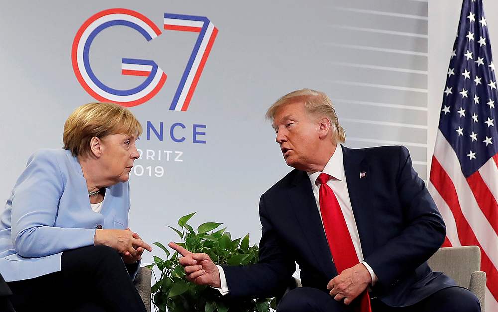 US President Donald Trump meets German Chancellor Angela Merkel for bilateral talks during the G7 summit in Biarritz, France August 26, 2019. u00e2u20acu201d Reuters pic