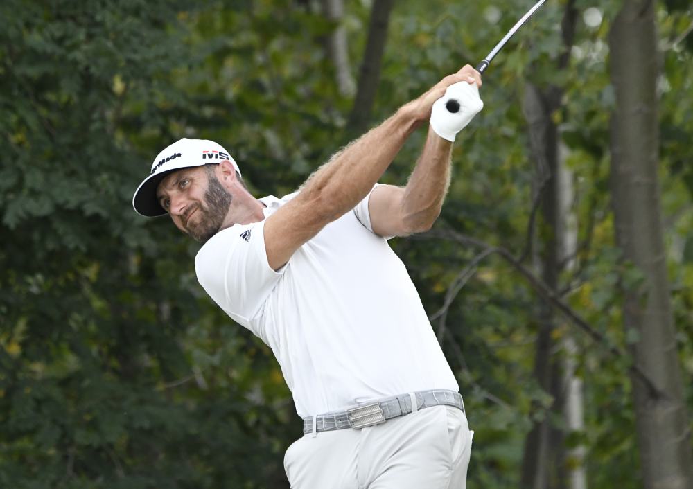 Dustin Johnson hits his tee shot on the 18th hole during the second round of The Northern Trust golf tournament at Liberty National Golf Course in New Jersey August 10, 2019. u00e2u20acu2022 Picture by Mark Konezny-USA TODAY Sports via Reuters