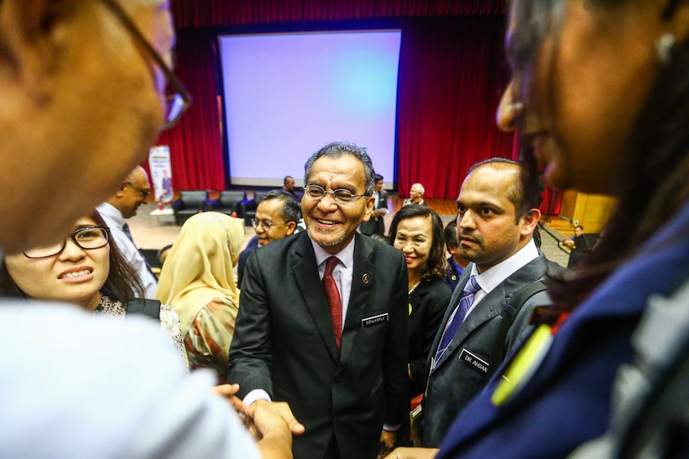 Health Minister Datuk Seri Dzulkefly Ahmad mingles with people after the Health Ministry Town Hall Session with pharmacists in Putrajaya August 8, 2019. u00e2u20acu201d Picture by Hari Anggara