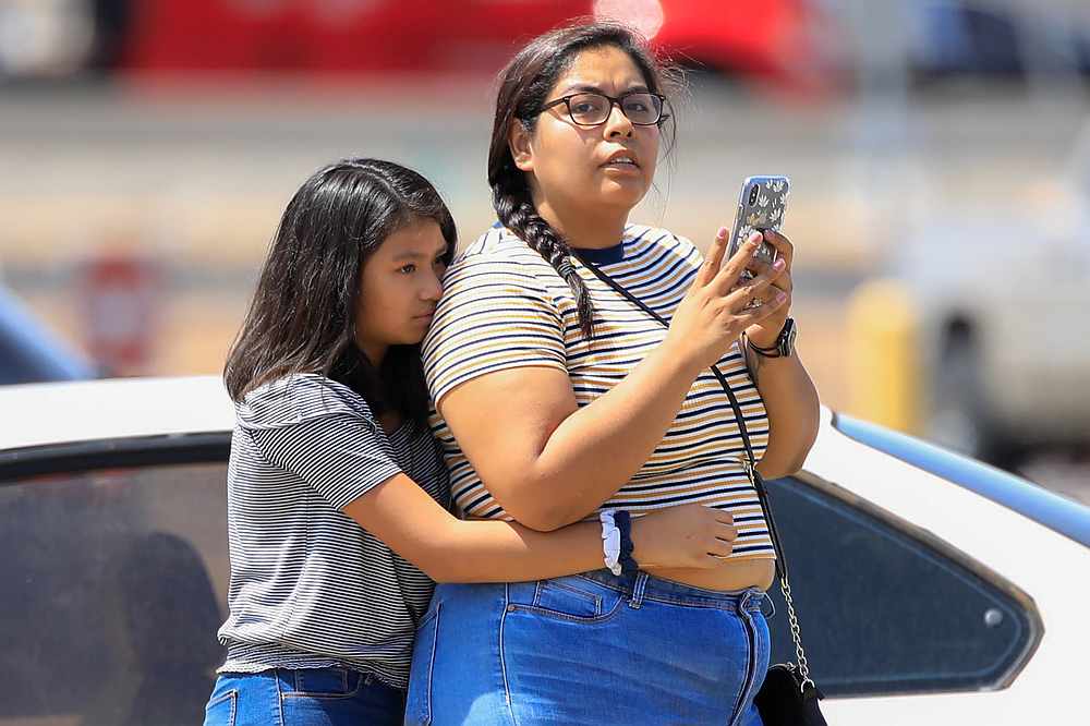 A girl reacts after a mass shooting at a Walmart in El Paso, Texas August 3, 2019. u00e2u20acu201d Reuters pic 