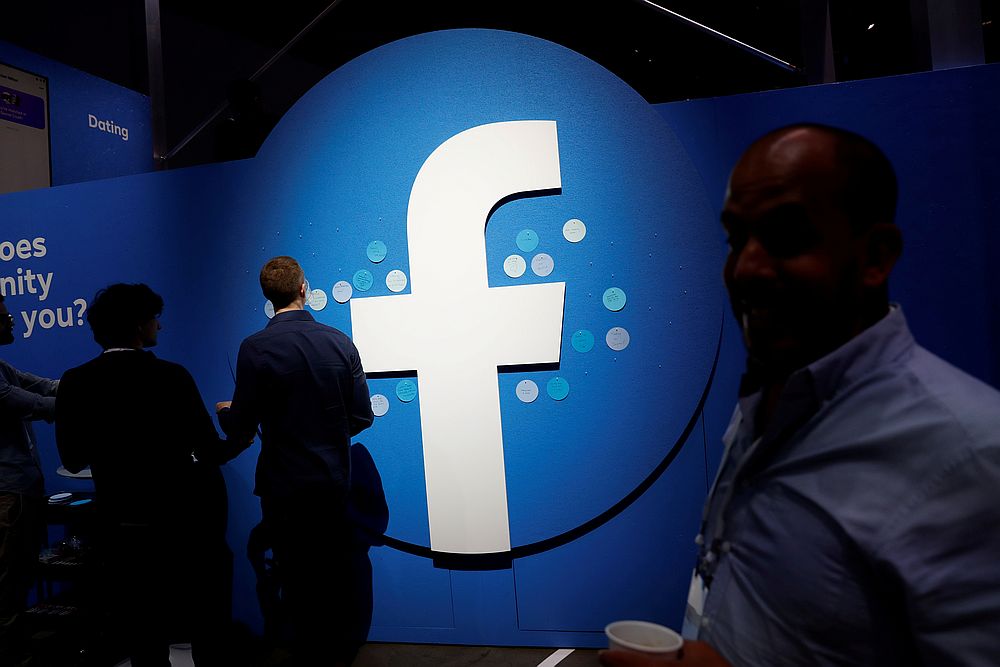 Attendees walk past a Facebook logo during Facebook Inc's F8 developers conference in San Jose, California April 30, 2019. u00e2u20acu201d Reuters pic