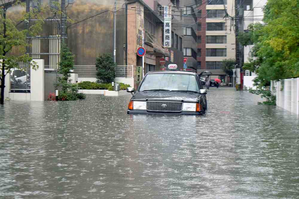 A taxi is stuck in floodwaters caused by heavy rain, in Saga, southern Japan August 28, 2019. — Kyodo pic via Reuters