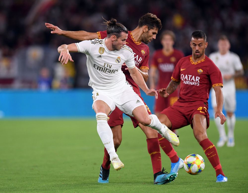 Real Madrid's Gareth Bale in action with AS Roma's Federico Fazio. u00e2u20acu2022 Reuters pic