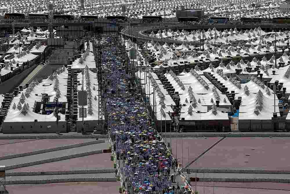 Muslim pilgrims walk to cast their stones at a pillar symbolising the stoning of Satan during the annual Haj pilgrimage in Mina, Saudi Arabia August 11, 2019. u00e2u20acu201d Reuters pic