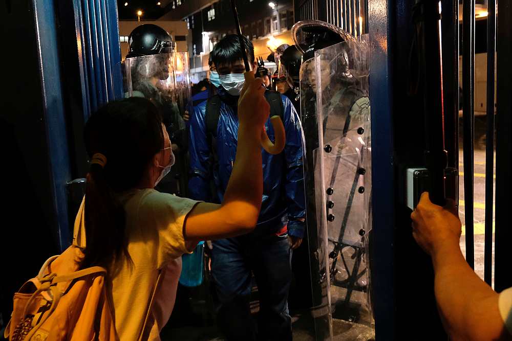 An arrested anti-extradition bill protester leaves a police station on bail as his friends wait for him in Hong Kong July 30, 2019. u00e2u20acu201d Reuters pic