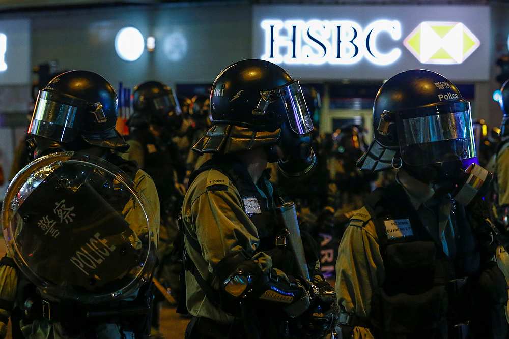 Riot police stand outside a branch of the HSCB bank in Wan Chai during clashes with protesters in Hong Kong August 11, 2019. u00e2u20acu201d Reuters pic