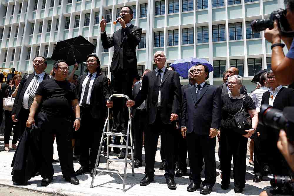 Lawyers and workers in Hong Kong's legal sector gather outside the Department of Justice during a protest in Hong Kong August 7, 2019. u00e2u20acu201d Reuters pic