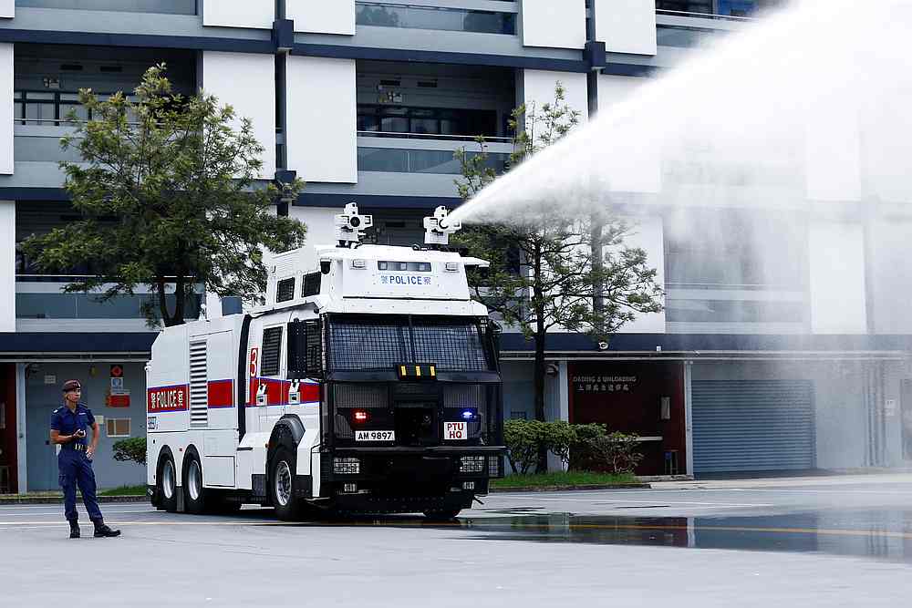 Police demonstrate a water cannon equipped vehicle at the compound of the Police Tactical Unit in Hong Kong August 12, 2019. u00e2u20acu201d Reuters pic