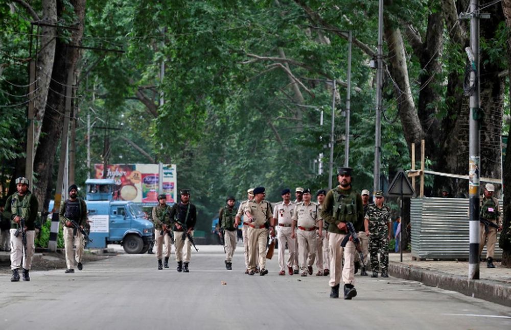 Indian security force personnel patrol a road during restrictions after the government scrapped the special constitutional status for Kashmir, in Srinagar August 15, 2019. u00e2u20acu201d Reuters pic