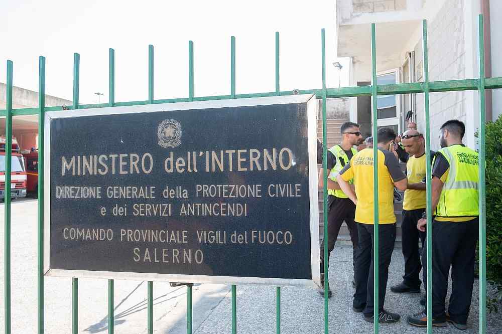 Rescuers stand in the grounds of the rescue coordination centre during the search operation for missing French hiker Simon Gautier in Policastro Bussentino, southern Italy August 18, 2019. u00e2u20acu201d AFP pic