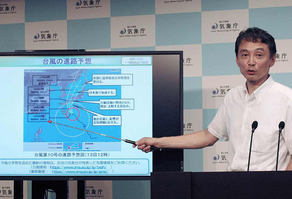 Ryuta Kurora, a chief forecaster of Japan meteorological agency, holds a press conference on tropical storm Krosa approaching western Japan in Tokyo on August 13, 2019. u00e2u20acu201d AFP pic