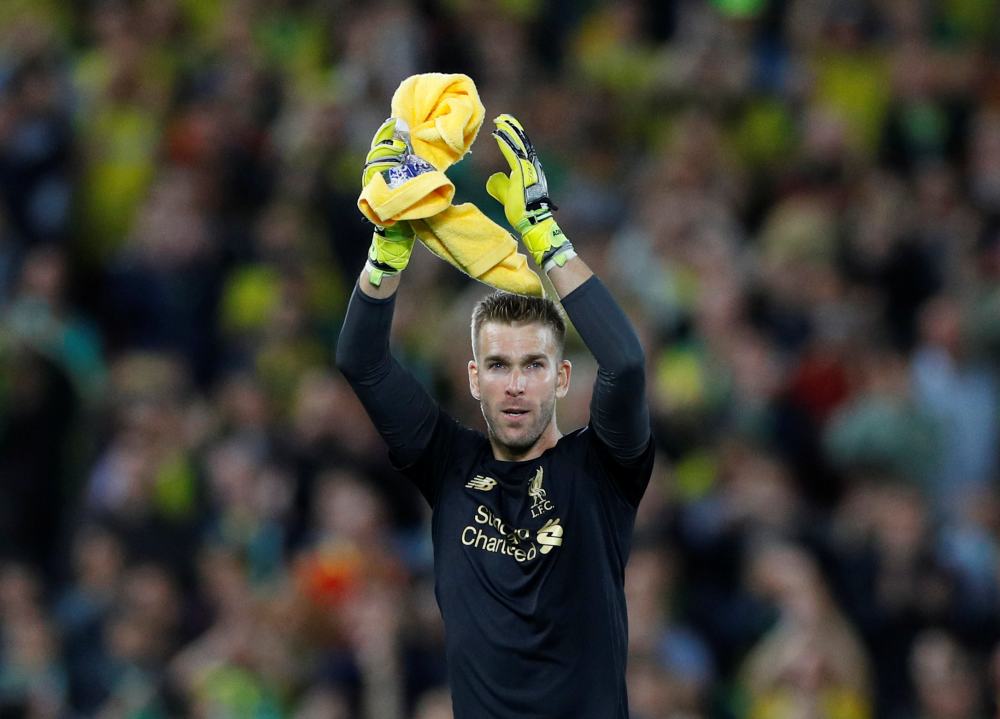 Liverpool's Adrian applauds their fans as he celebrates after the match against Norwich City, August 9, 2019. u00e2u20acu2022 Reuters pic