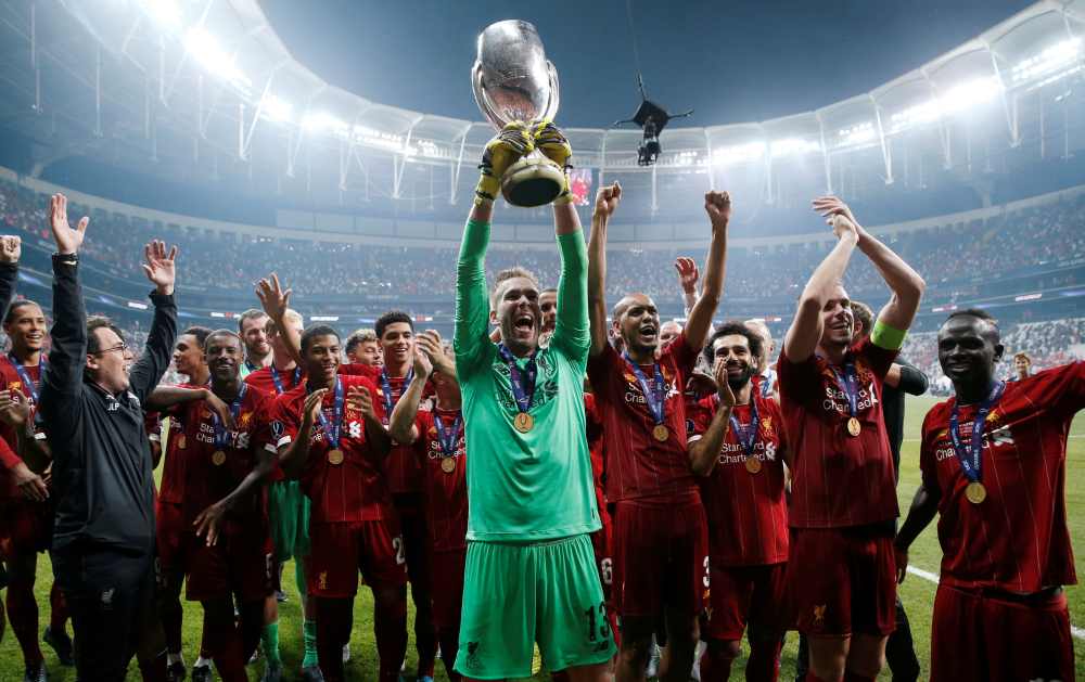 Liverpool's Adrian lifts the trophy as he celebrates winning the Uefa Super Cup with team mates, August 14, 2019. u00e2u20acu2022 Reuters pic 