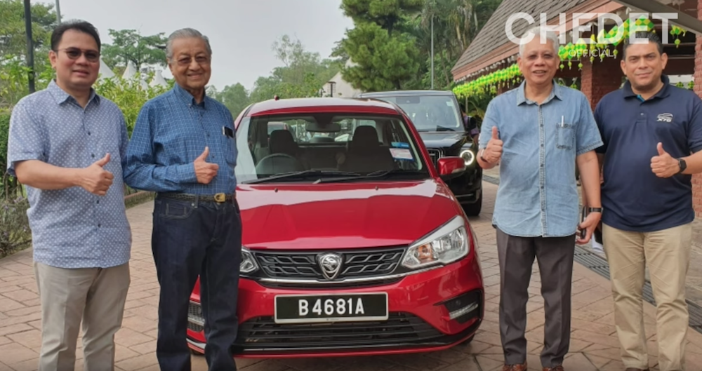 Dr Mahathir gives a thumbs up after taking the 2019 Saga for a spin today. u00e2u20acu201d Screengrab via YouTube/Chedet