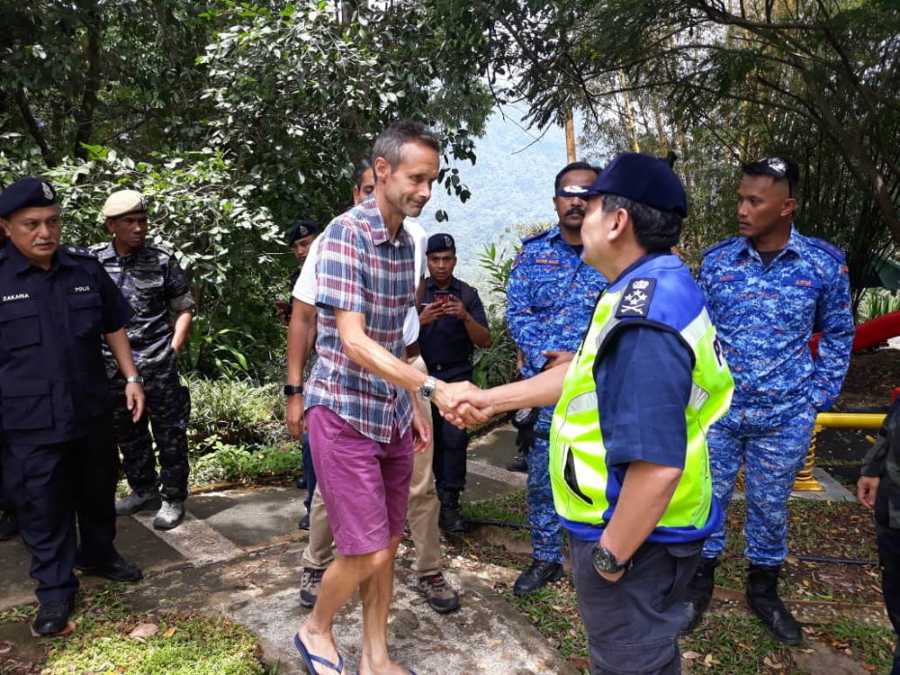 Deputy Inspector-General of Police Datuk Mazlan Mansor speaks with Nora Anne’s father, Sebastian Quoirin August 11, 2019. — Picture courtesy of Royal Malaysian Police