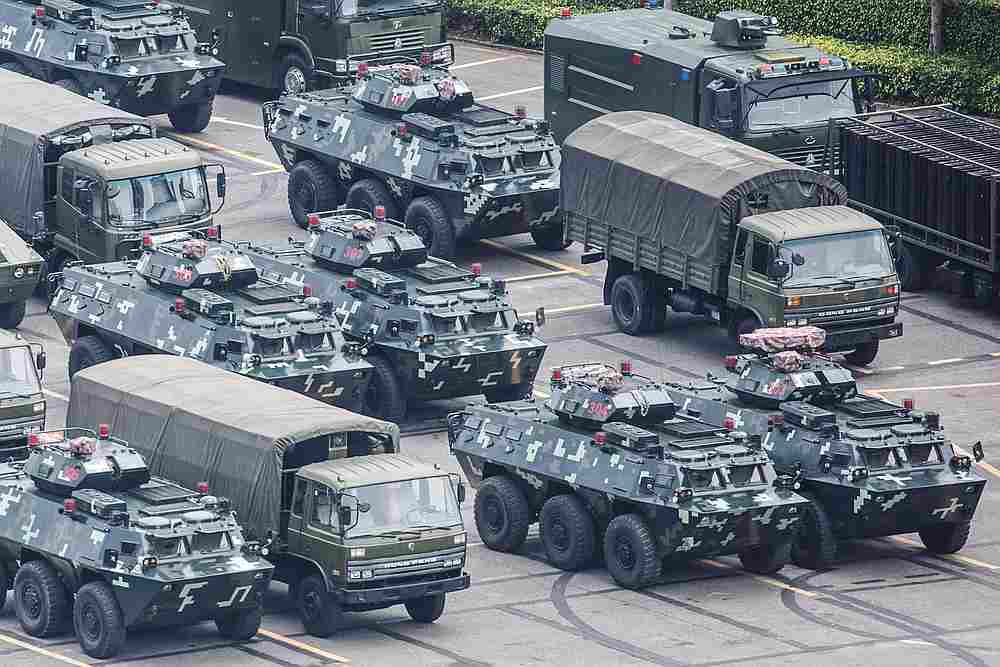 Military vehicles are parked on the grounds of the Shenzhen Bay Sports Centre in Shenzhen, China August 15, 2019. u00e2u20acu201d Reuters pic