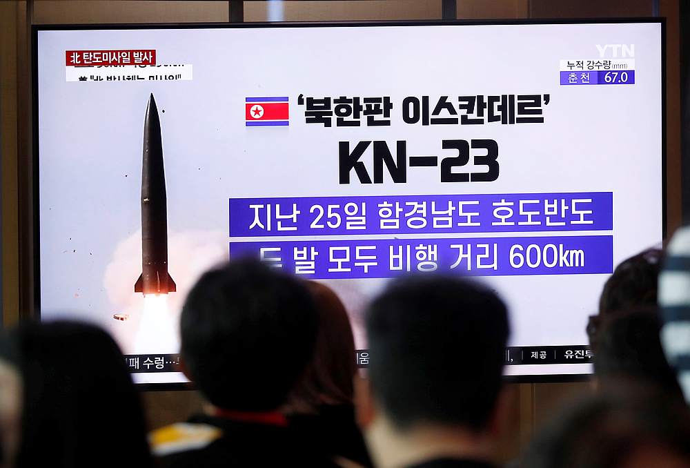 People watch a TV broadcast of a news report on North Korea firing short-range ballistic missiles, in Seoul, South Korea July 31, 2019. u00e2u20acu201d Reuters pic