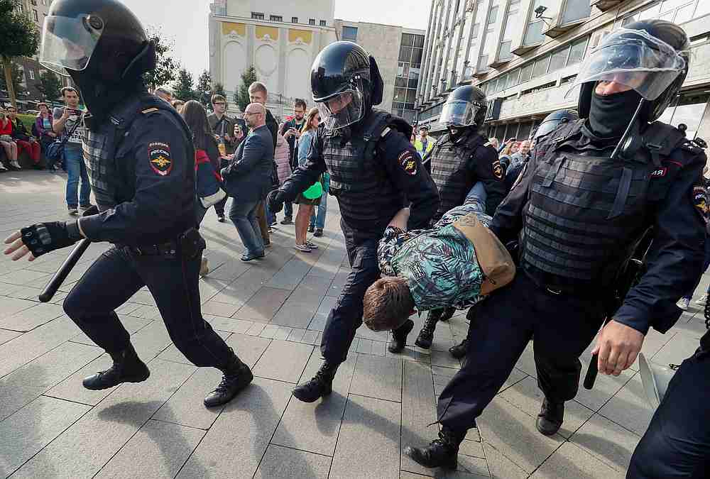 Law enforcement officers detain a participant in a rally calling for opposition candidates to be registered for elections to Moscow City Duma, the capital's regional parliament, in Moscow August 3, 2019. u00e2u20acu201d Reuters pic 
