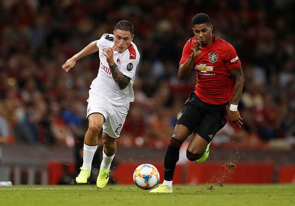 Manchester United's Marcus Rashford (right) in action with AC Milan's Davide Calabria Action at Cardiff August 3, 2019. u00e2u20acu201d Reuters pic