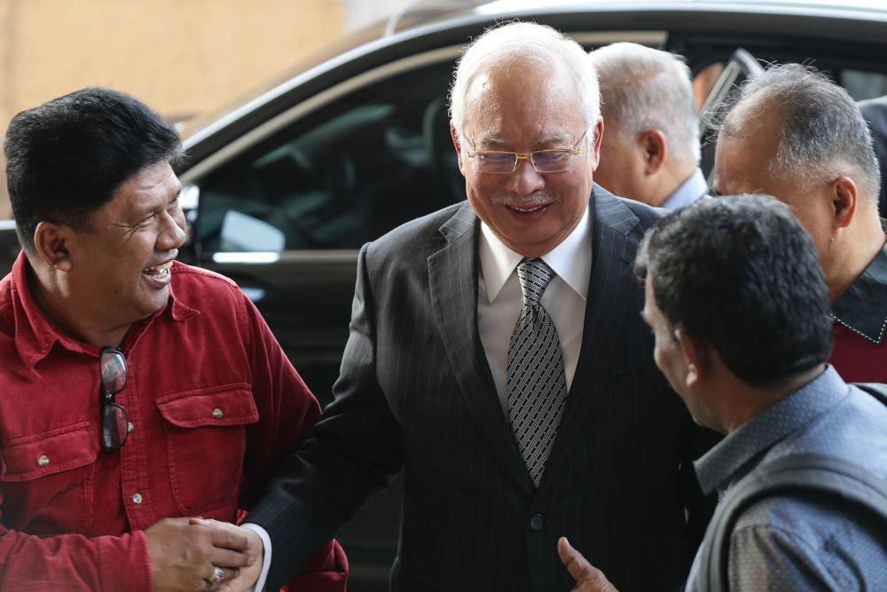 Datuk Seri Najib Razak arrives at the Kuala Lumpur High Court August 22, 2019. u00e2u20acu201d Picture by Ahmad Zamzahuri