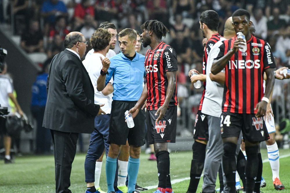 Referee Clement Turpin (centre) halted the match between Marseille and Nice in the first half following homophobic abuse from the latteru00e2u20acu2122s supporters. u00e2u20acu201d Reuters picnn