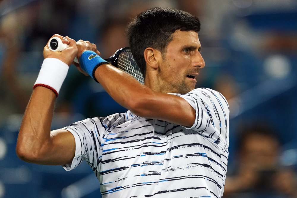 Novak Djokovic (pic) returns a shot against Lucas Pouille during the Western and Southern Open tennis tournament at Cincinnati August 16, 2019. u00e2u20acu2022 Picture by Aaron Doster-USA TODAY Sports vis Reuters