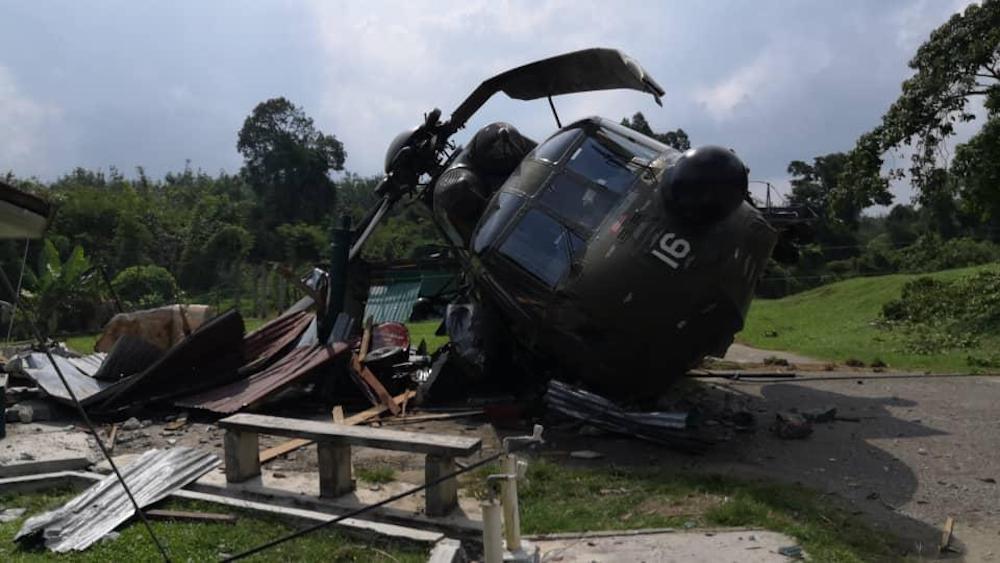 Fifteen people were injured when the Nuri helicopter made an emergency landing at the Gubir Camp area in Kedah today. u00e2u20acu201d Picture via Twitter/Bernamadotcom