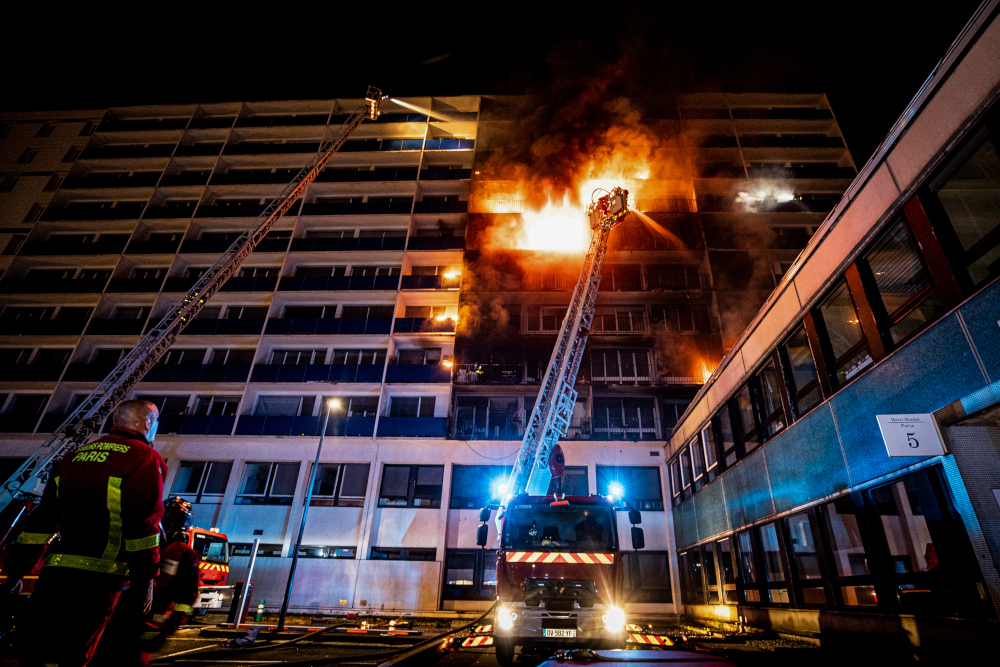 This handout picture released by the Paris Fire Brigade shows firefighters intervening to extinguish a fire at Henri-Mondor Hospital in Creteil, the suburbs of Paris, early August 22, 2019. u00e2u20acu201d Sylvia Borel/BSPP-Brigade de sapeurs-pompiers de Paris handou